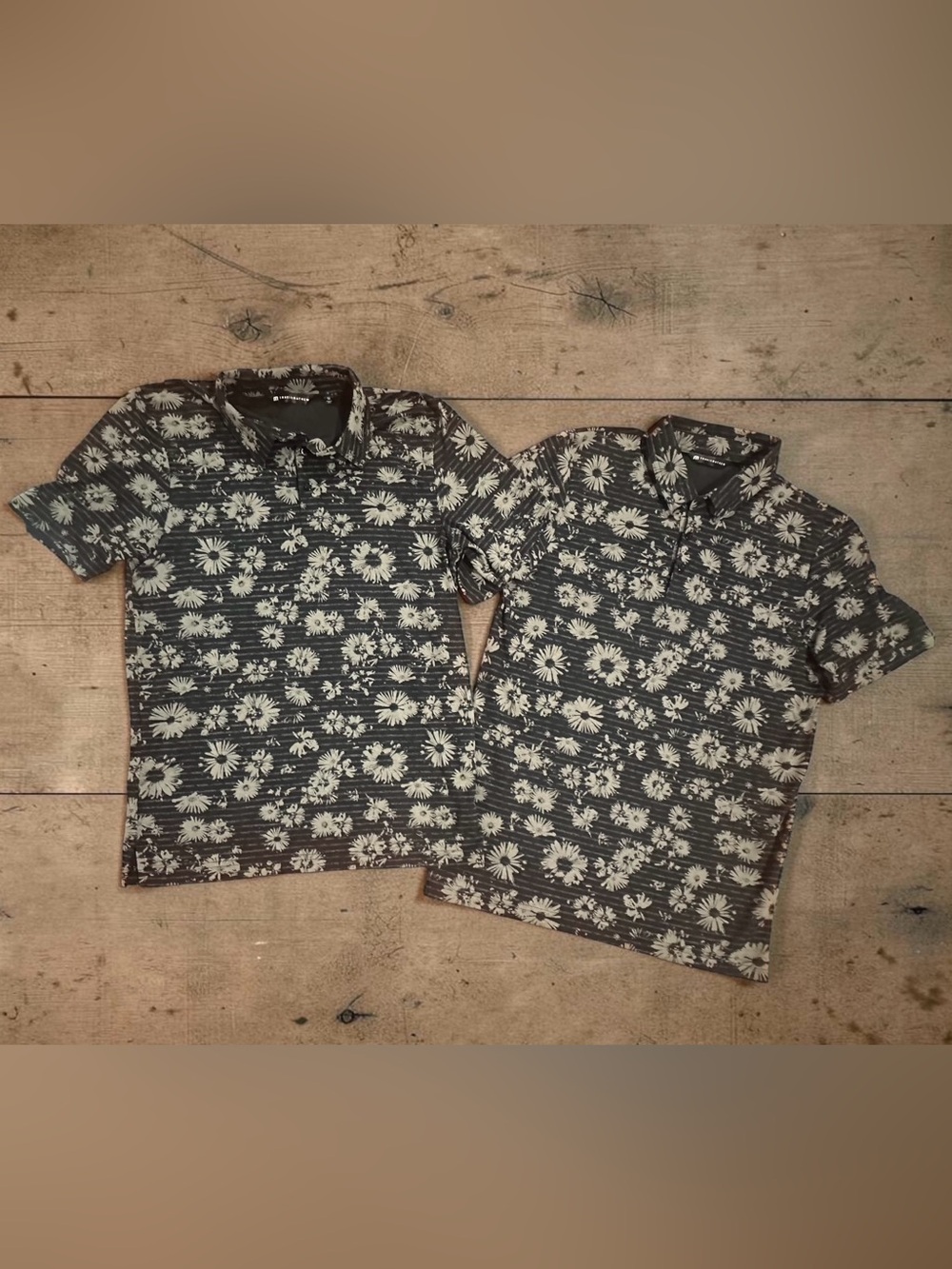 Pair of Travis Mathew Black & Tan Floral Stripe Polo Style Golf Shirts